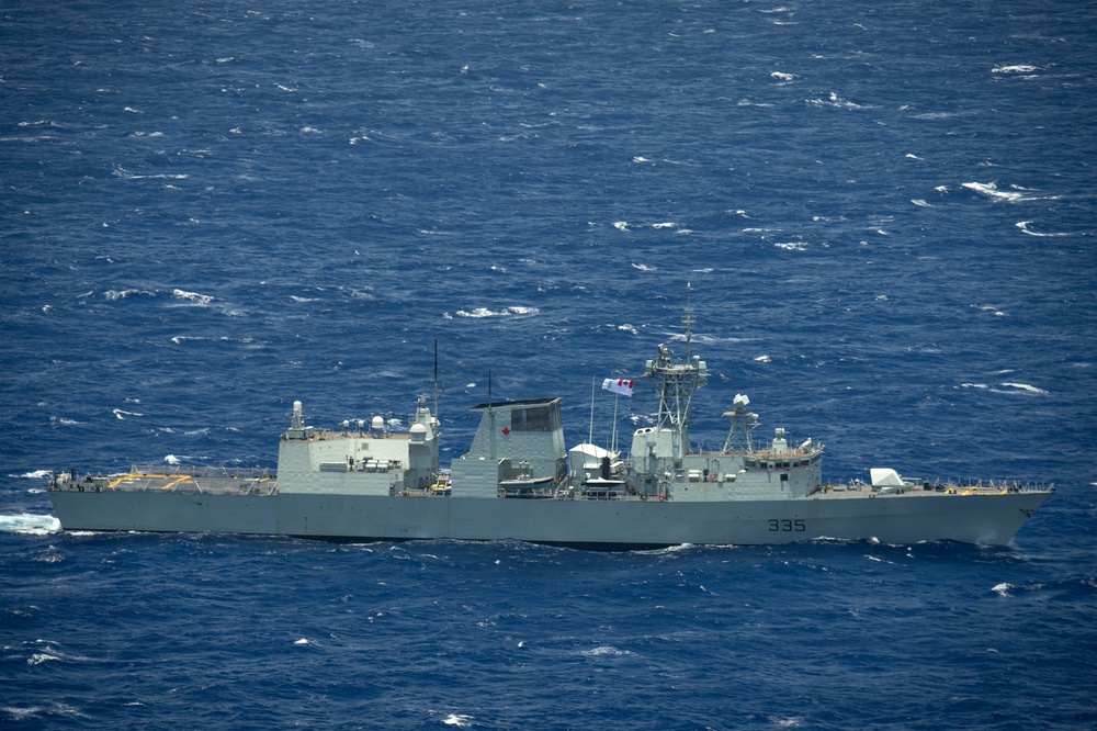 Forty Ships and Submarines Steam in Close Formation During RIMPAC - HMCS Calgary (FF 335)