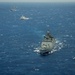 Forty Ships and Submarines Steam in Close Formation During RIMPAC - INS Satpura (F48)