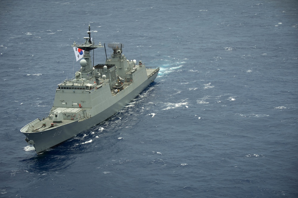 Forty Ships and Submarines Steam in Close Formation During RIMPAC - ROKS Kang Gam Chan (DDH 979)