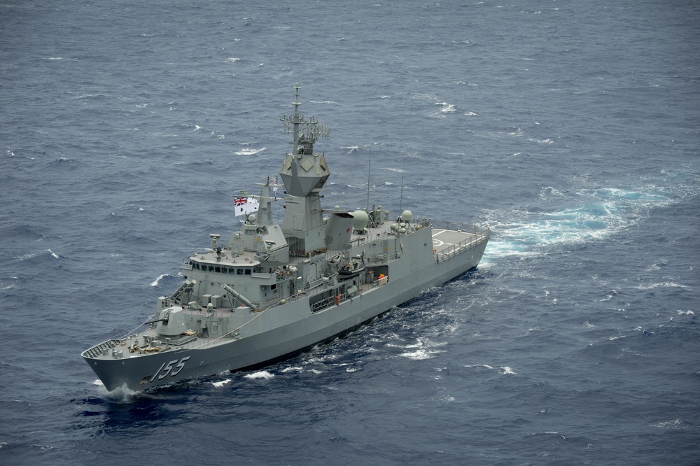 Forty Ships and Submarines Steam in Close Formation During RIMPAC - HMAS Ballarat (FFH 155)