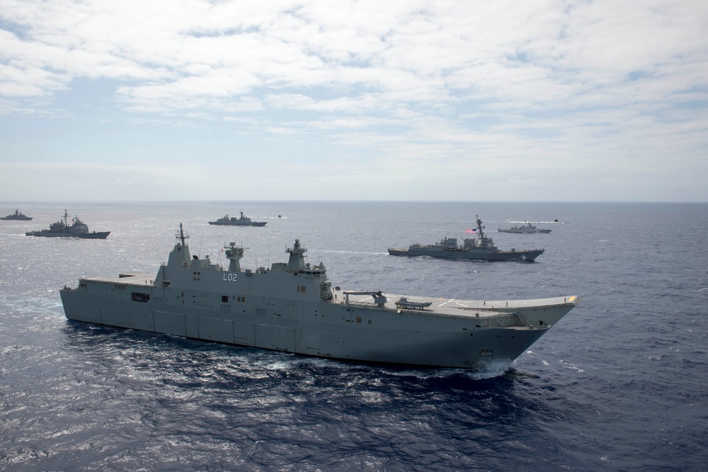 Forty Ships and Submarines Steam in Close Formation During RIMPAC - HMAS Canberra (L02)