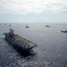 Forty Ships and Submarines Steam in Close Formation During RIMPAC - USS America (LHA 6)