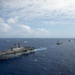 Forty Ships and Submarines Steam in Close Formation During RIMPAC - USS America (LHA 6)