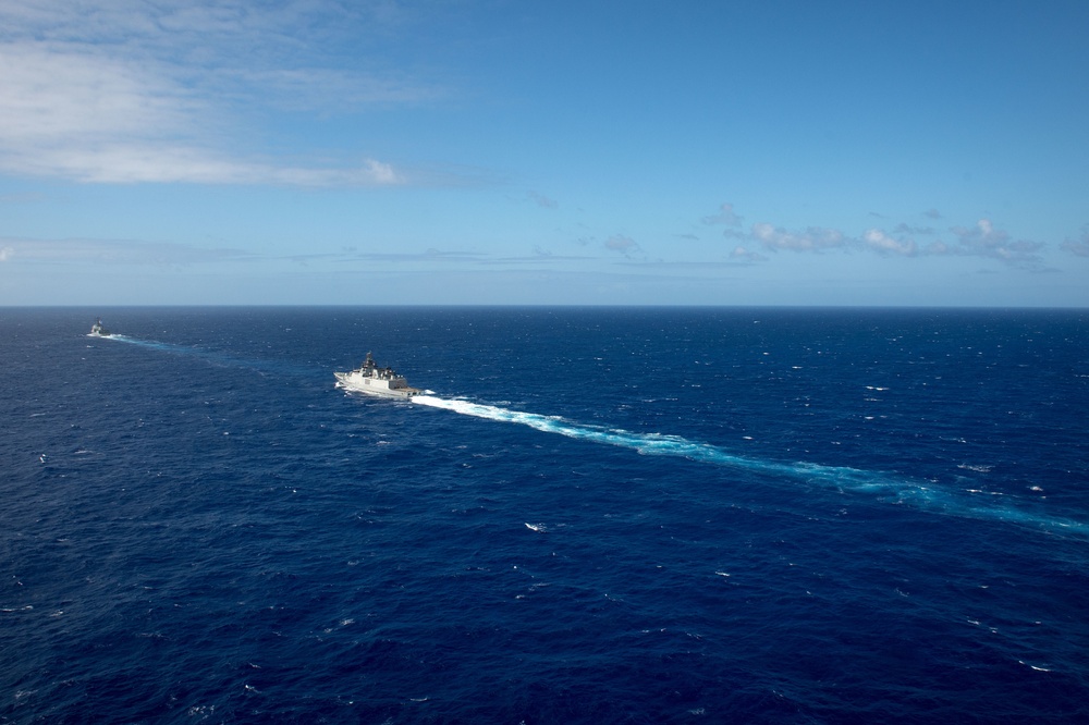 Forty Ships and Submarines Steam in Close Formation During RIMPAC - INS Satpura (F48) and ROKS Sejong the Great (DDG 991)