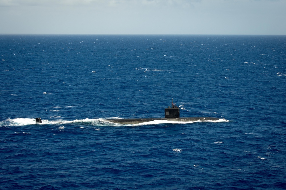 Forty Ships and Submarines Steam in Close Formation During RIMPAC - USS Tucson (SSN 770)