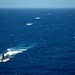 Forty Ships and Submarines Steam in Close Formation During RIMPAC - USS Cheyenne (SSN 773), ROKS Lee Eokgi (SS 071) USS Tucson (SSN 770) and USS Santa Fe (SSN 763)