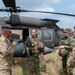 Blackhawk Crew Chief and Canadian Soldiers