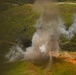 Explosive Ordnance Disposal technicians, reconnaissance Marines practice standoff munitions disruption