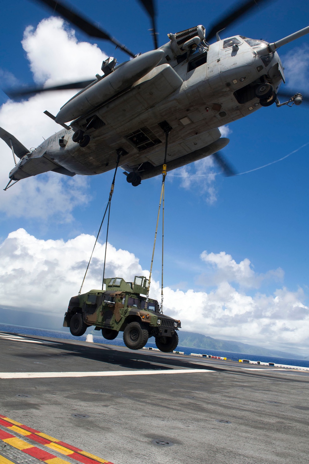 CH-53E offloads Humvee From America