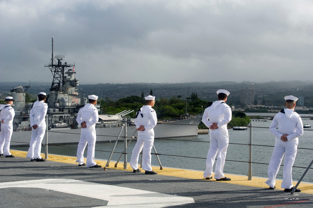 USS America Mans the Rails while pulling into Hawaii