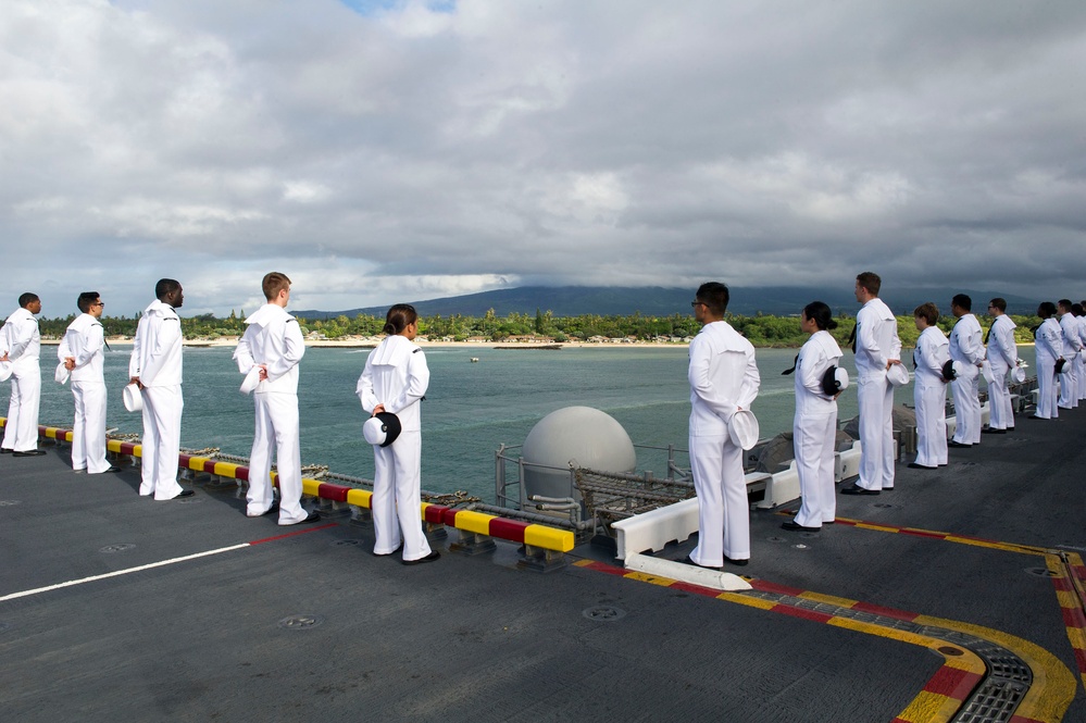 USS America mans the rails while pulling in to Pearl Harbor