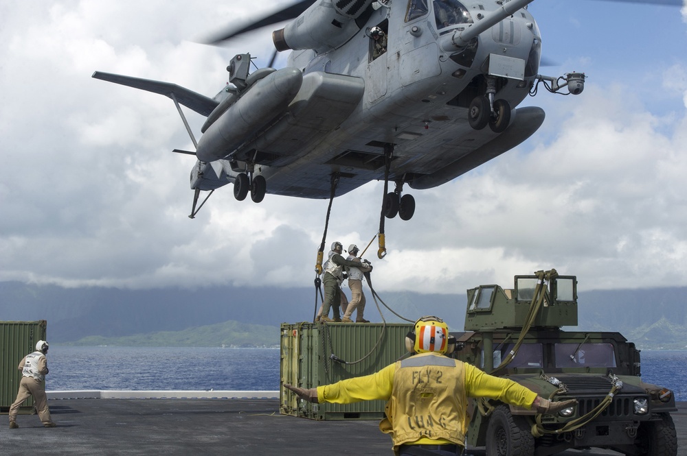 CH-53E offloads Humvee From America