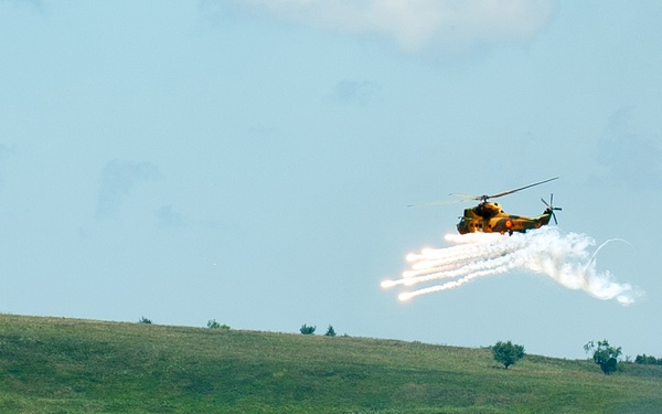 Helicopter rains fire