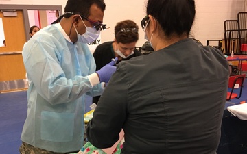 Army Reserve dentist sees patient during Operation Lone Star
