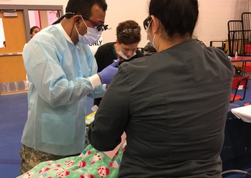 Army Reserve dentist sees patient during Operation Lone Star