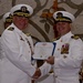 COMSUBRON 15 presents the Legion of Merit to outgoing USS Topeka CO during change of command