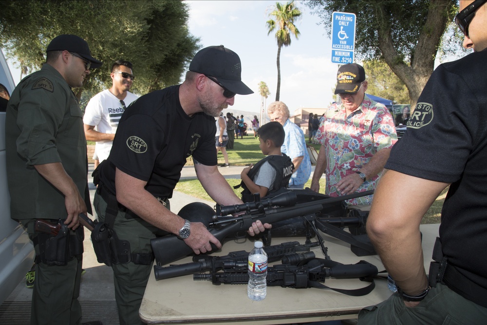 Members of the Special Response Team with Barstow Police Department demonstrated equipment and gear with citizens during the National Night Out celebrations hosted by Barstow PD in Barstow, Calif., Aug. 2. The event was hosted by police departments nation