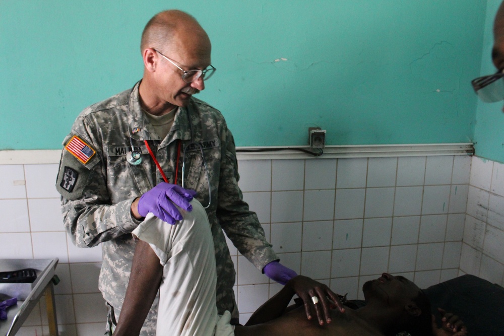 Army Reserve physician sees patient in Chad hospital