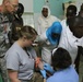 Army Reserve medical personnel demonstrate techniques for emergency room students in Chad hospital