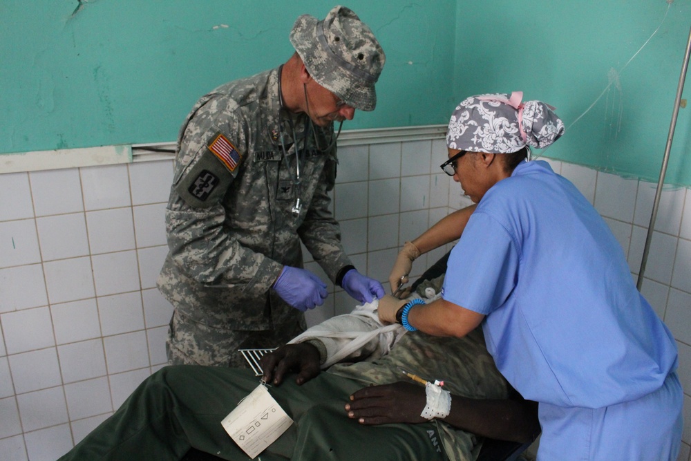 Army Reserve medical personnel provide care to Chadian combat wounded in Chad hospital