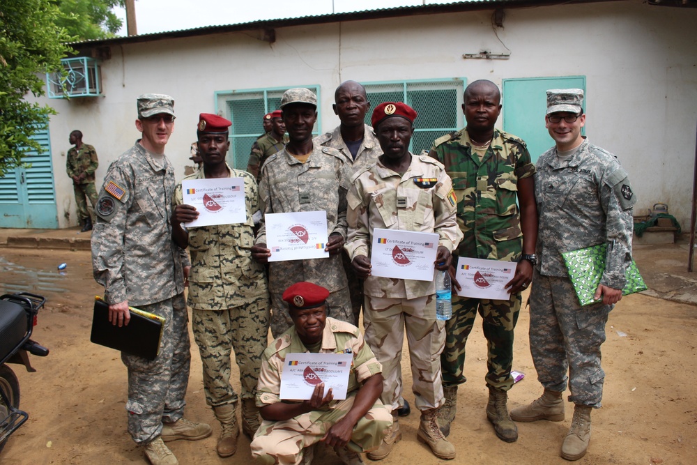 Chadian military forces and Army Reserve medical personnel pose for photo at Chad hospital