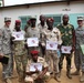 Chadian military forces and Army Reserve medical personnel pose for photo at Chad hospital