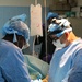 Chadian Army and Army Reserve surgeons work together to work on Chadian combat wounded in Chad hospital