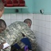 Army Reserve health care specialist provides care to Chadian combat wounded in Chad hospital