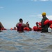 Airmen perform water survival