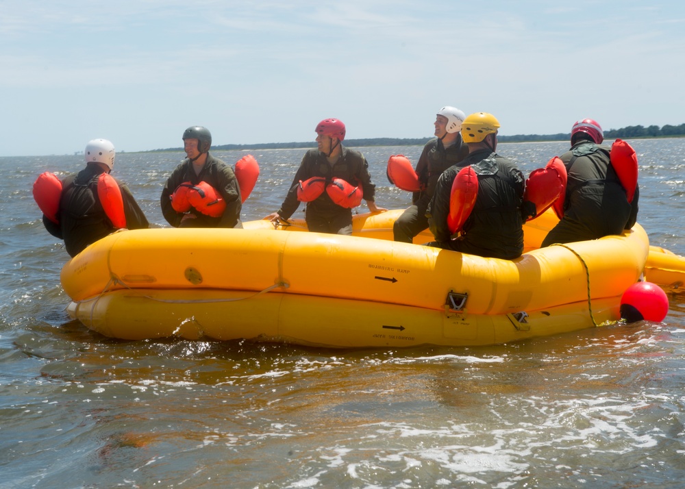 Airmen perform water survival