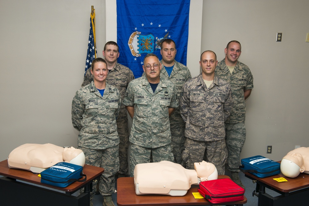 Three Airmen from the 167th Airlift Wing in Martinsburg, W.Va. put CPR training into action during an accident on I-81, June 12