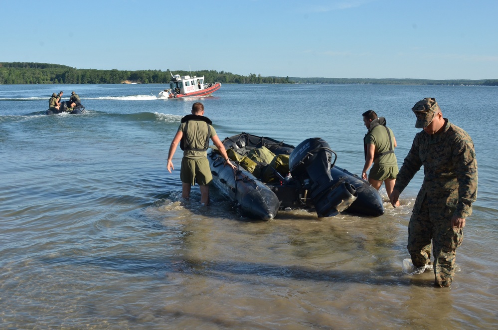 Safety boat and safety swimmer support