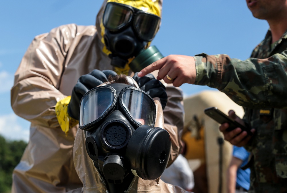Albanian Soldiers practice decontamination