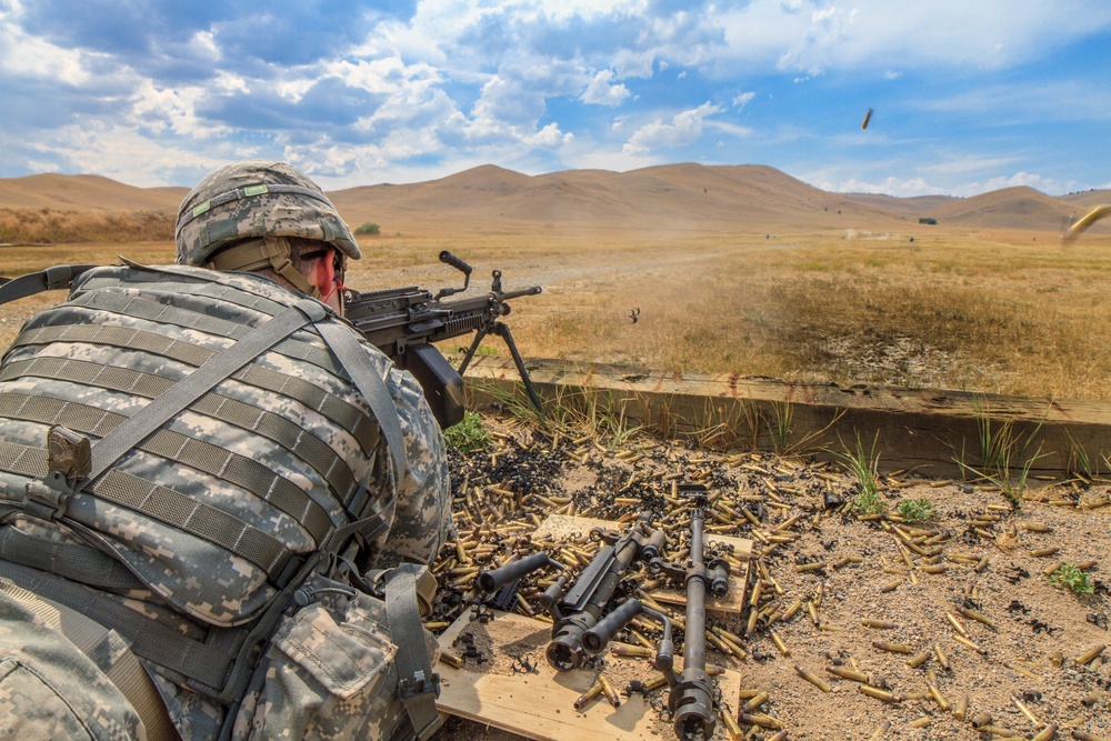 Spc. Carlo Deldonno fires M-249