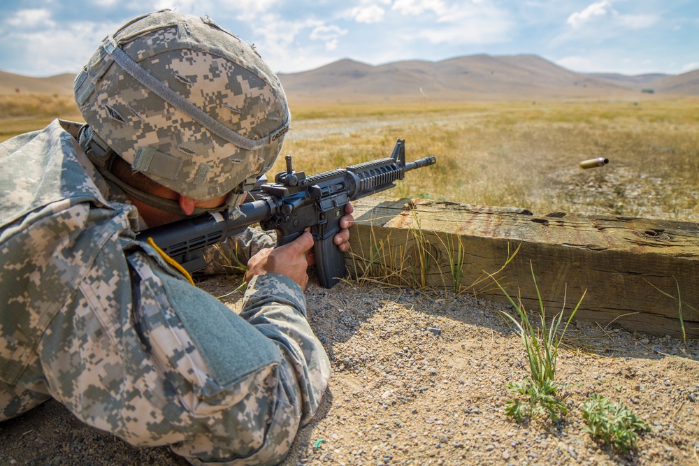 Spc. Michael S. Orozco fires M-4