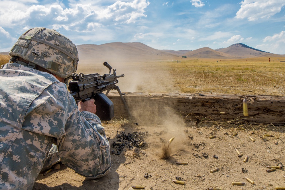 Sgt. 1st Class Robert Jone fires a M249