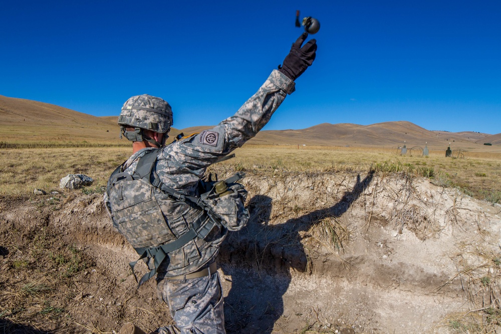 Sgt. 1st Class Robert Jones throws grenade