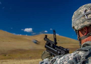 Sgt. 1st Class Joshua Moeller fire a M-320 grenade launcher