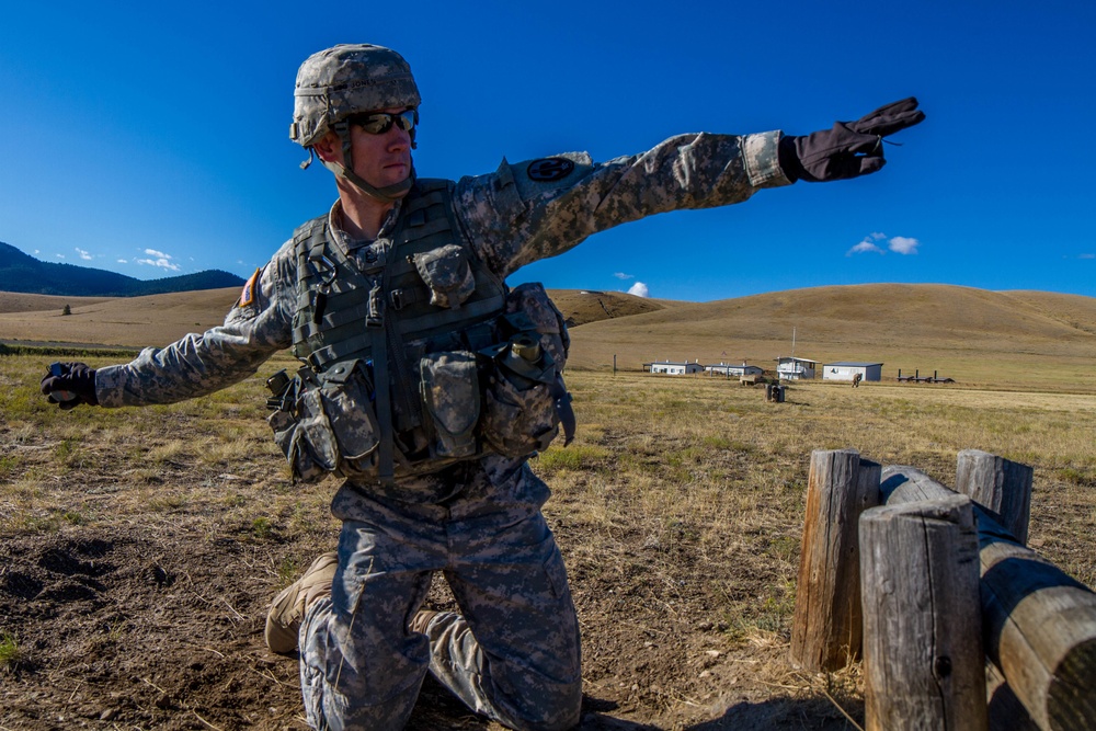 Sgt. 1st Class Robert Jones throws grenade