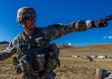 Sgt. 1st Class Robert Jones throws grenade