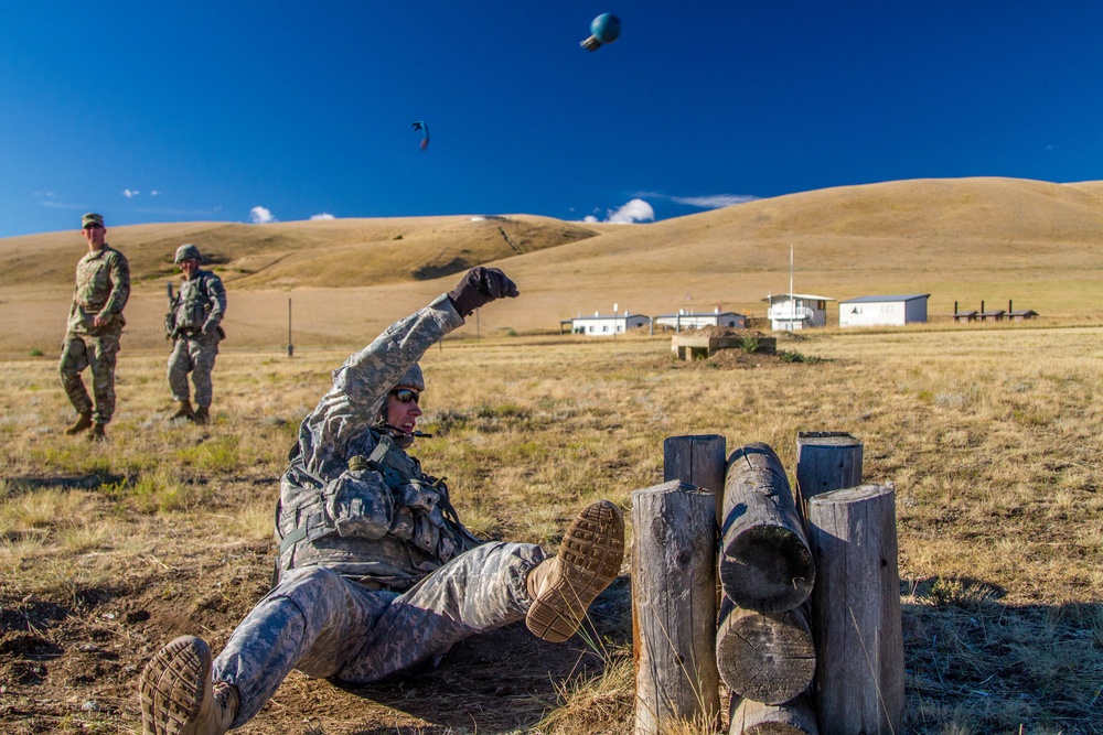 Sgt. 1st Class Robert Jones throws grenade