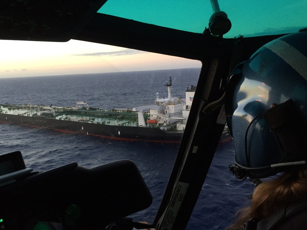 MH-65 Dolphin helicopter crew conducts medevac 14 miles south of Oahu