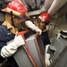 USS Shoup Sailors conduct a damage control drill