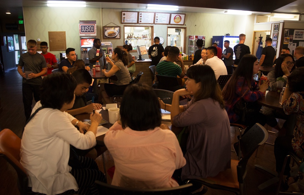 Okinawa residents attend English discussion class hosted by Status of Forces Agreement personnel