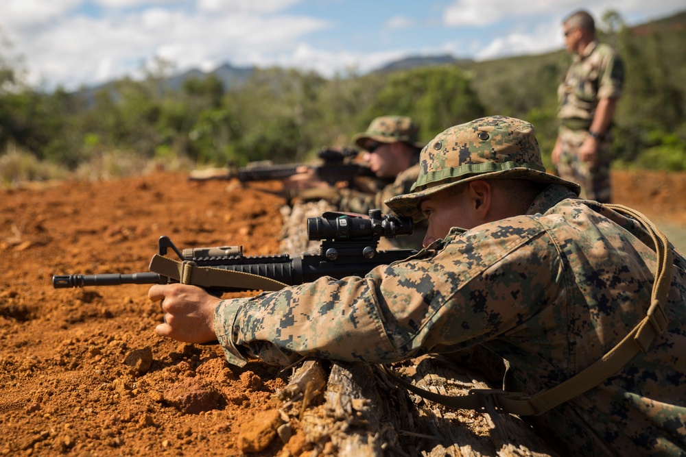 U.S. Marines run through French Army live-fire course