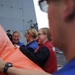 160811-N-LI612-152
PACIFIC OCEAN (August 11, 2016) Midshipmen laugh while preparing a killer tomato for a gun exercise on the flight deck aboard the Arleigh Burke-class guided-missile destroyer USS Shoup (DDG 86). Shoup is currently underway conducting ro