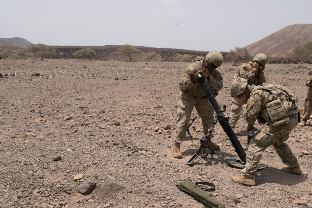 At my command: Soldiers participate in a mortar live fire exercise