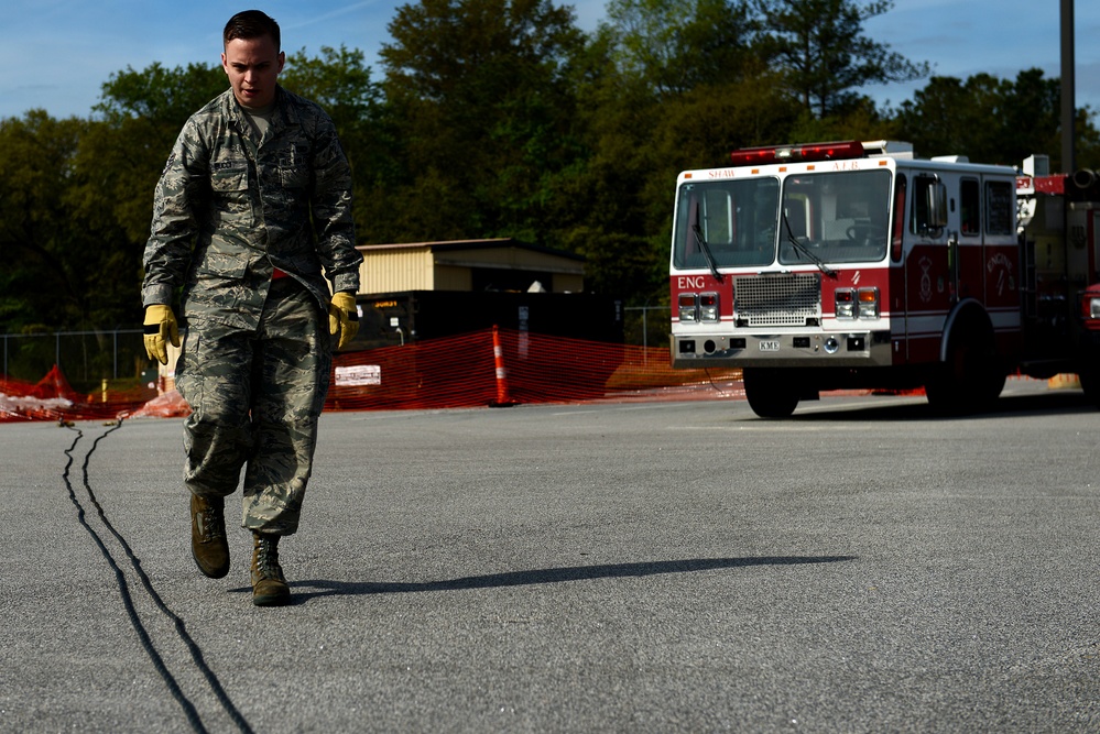 20th LRS vehicle operator inspects towing cables
