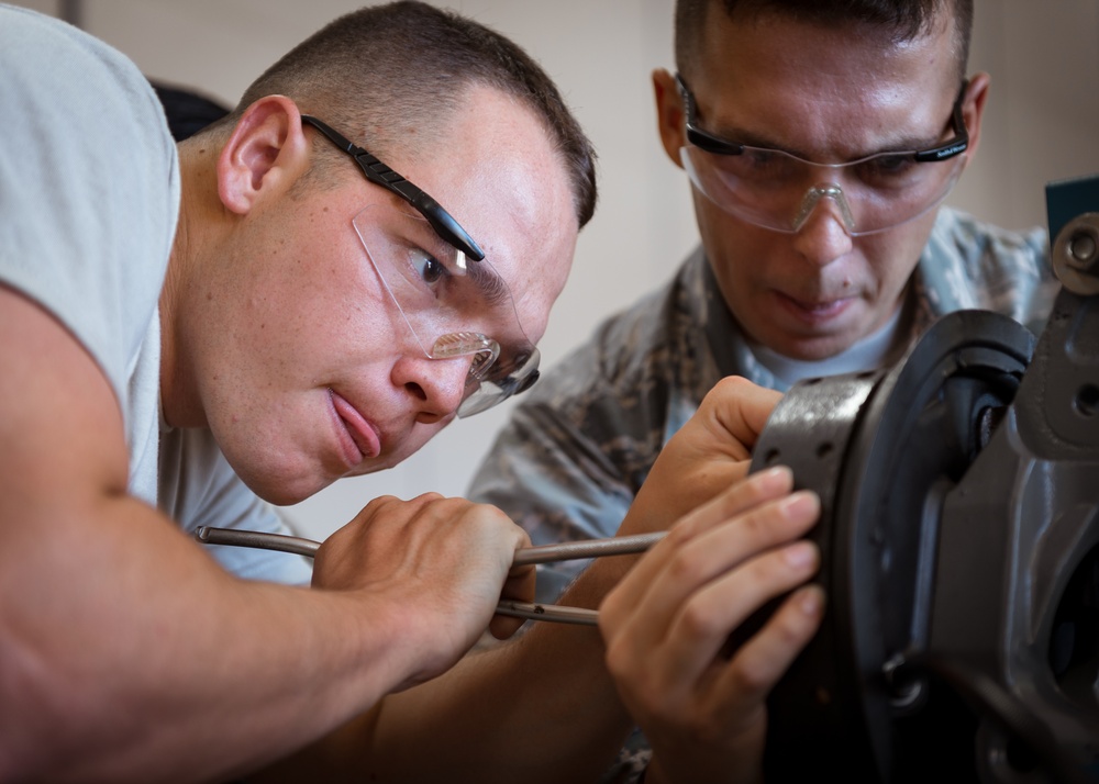 Vehicle mechanic students at Naval Construction Training Center