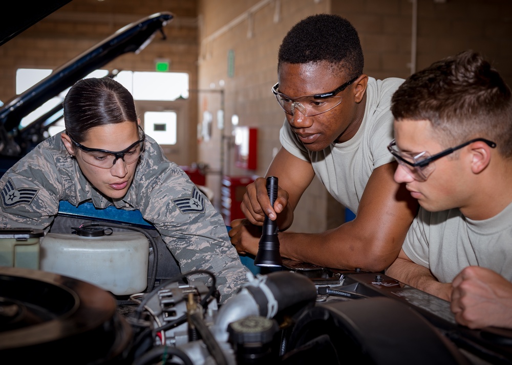 Vehicle mechanic students at Naval Construction Training Center